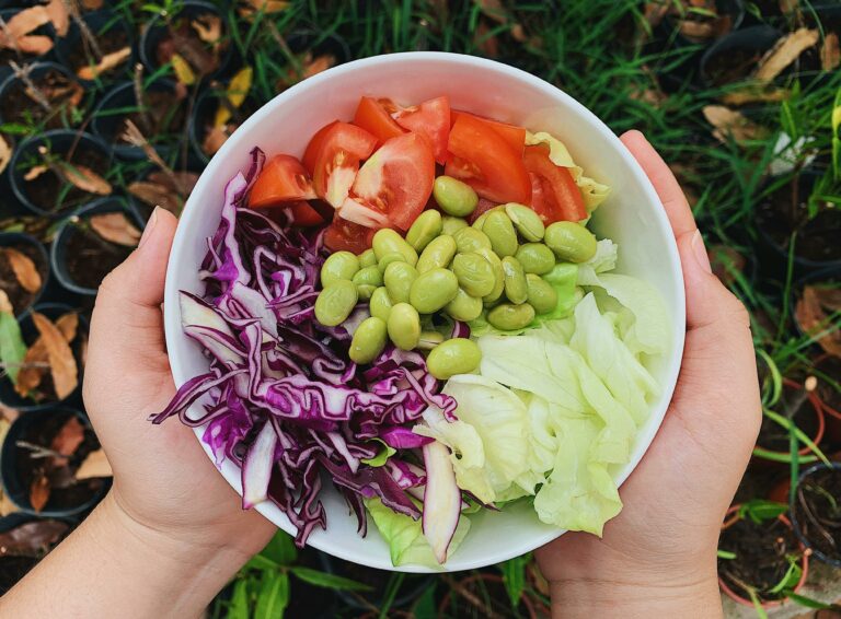 salad bowl with cabbage edemame and tomatoes